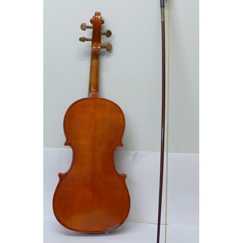 814 - A cased Stentor Student violin, 36cm back