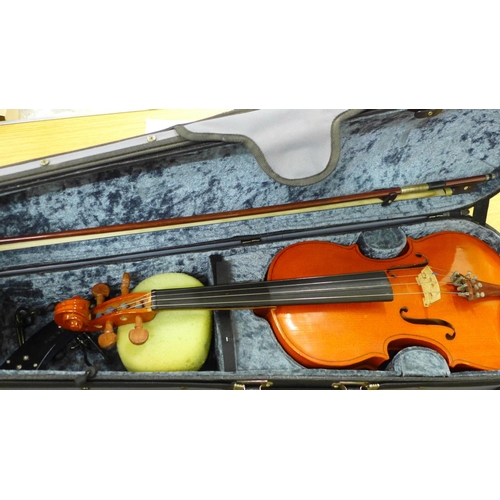 814 - A cased Stentor Student violin, 36cm back