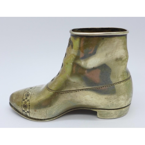 833 - A Victorian silver match holder/striker, in the form of a boot, London 1898,  156g, weighted