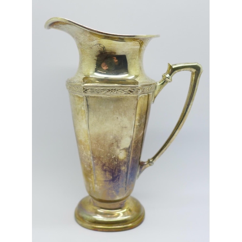 836 - A tall silver cream jug, Mappin & Webb, 175g, 14.5cm