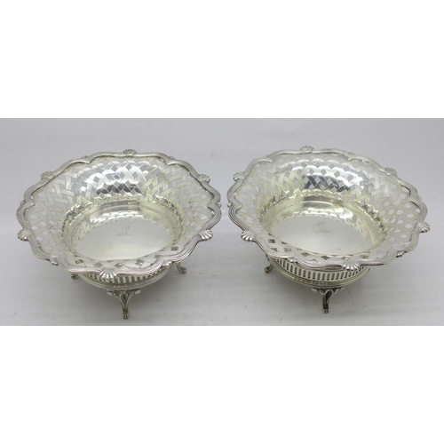 841 - A matched pair of silver bon bon dishes, both by Carrington & Co., London 1910 and 1918, total weigh... 