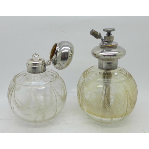 843 - A silver topped globular glass scent bottle and a similar atomiser