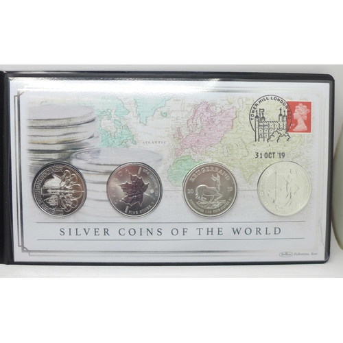 864 - A 2019 silver Coins of the World cover, includes 4 x 1oz fine silver coins, with Certificate of Auth... 