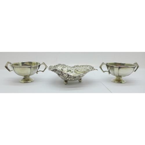 870 - A pierced silver dish and a pair of silver salts, 73g