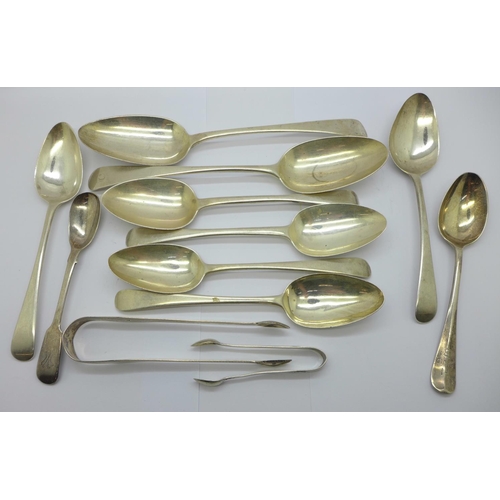 876 - A collection of silver spoons and two pairs of silver sugar bows, mainly 19th Century, 415g