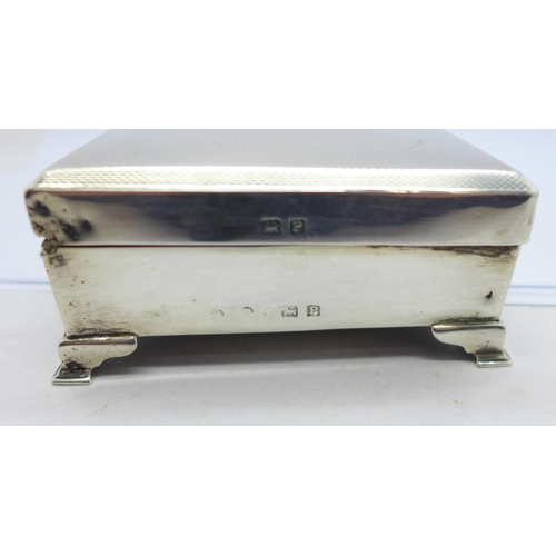 883 - A silver cigarette box, a/f