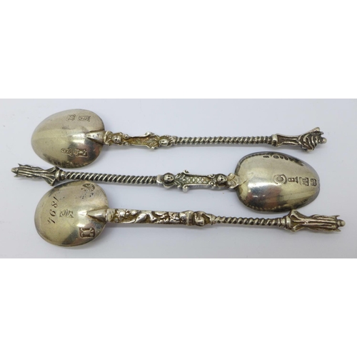 895 - Three late 19th Century 'grim reaper' spoons, possibly French, two with import mark for London 1892,... 