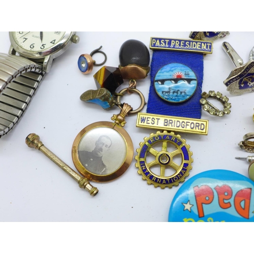 932 - A 9ct gold picture locket, acorn fob, pencil, cufflinks, badges and watches, etc.