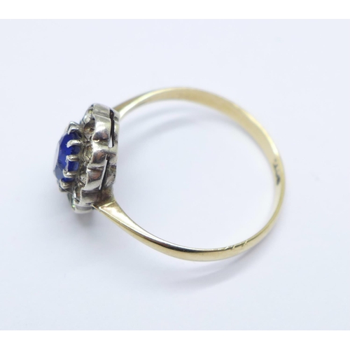 964 - A 9ct gold, blue and white stone ring, 2.3g, N