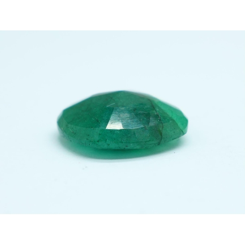 981 - A cushion cut emerald, 9carat weight