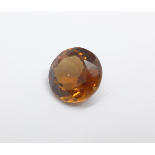 998 - An unmounted orange topaz, approximately 3.4carat weight