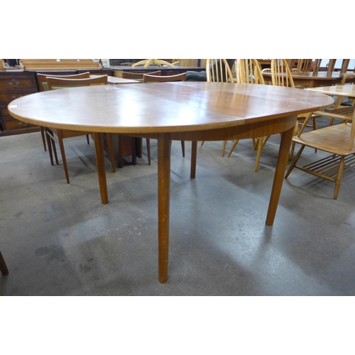 121 - A Mcintosh teak extending dining table