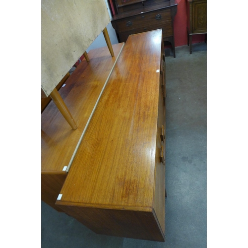 134 - A teak sideboard