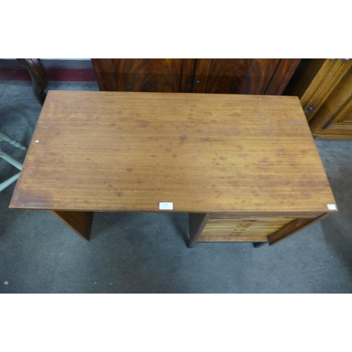 139 - A teak fitted desk