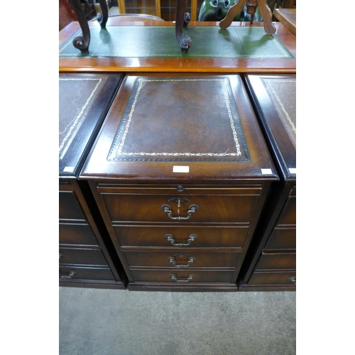 165 - A mahogany and leather topped filing cabinet