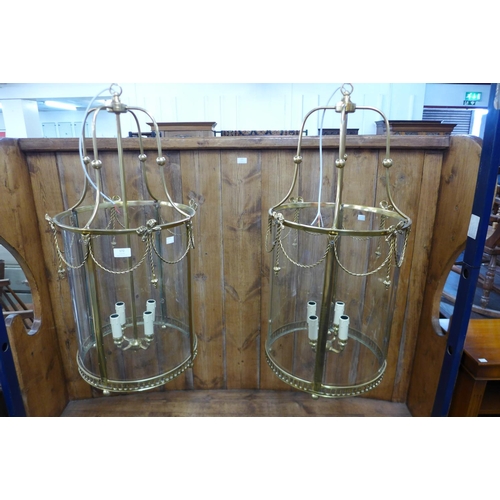 172 - A pair of French style gilt metal cylindrical hanging ceiling lanterns