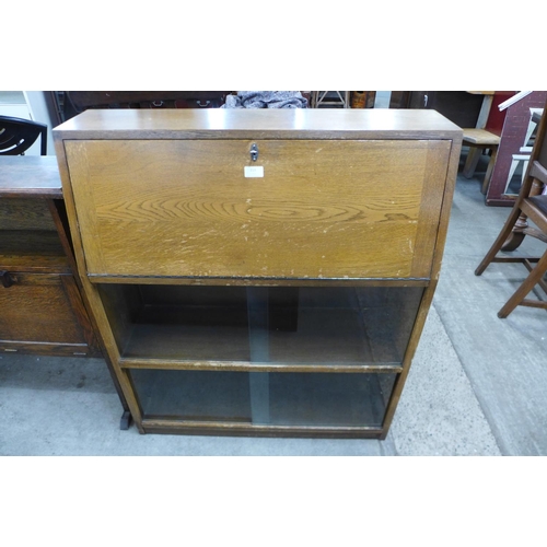 219 - A light oak bureau