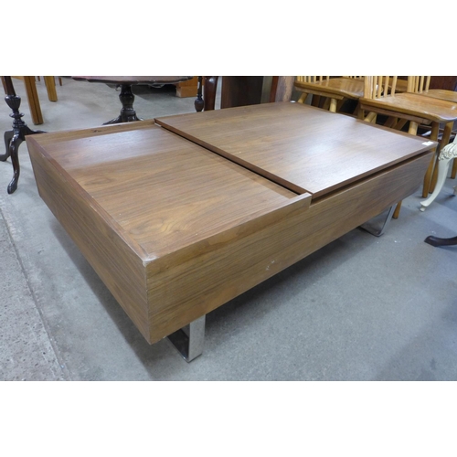 219a - A simulated oak and chrome metamorphic coffee table