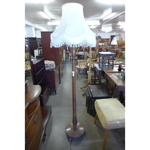 255 - An oak standard lamp