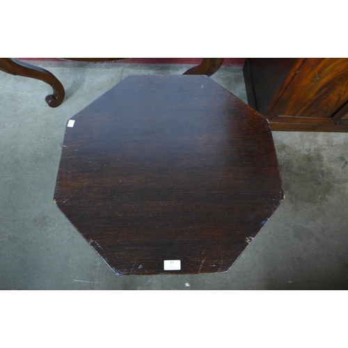 37 - An Arts and Crafts oak octagonal occasional table