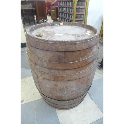 395 - A coppered oak barrel