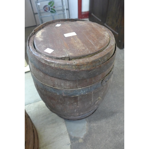 396 - A coppered oak barrel