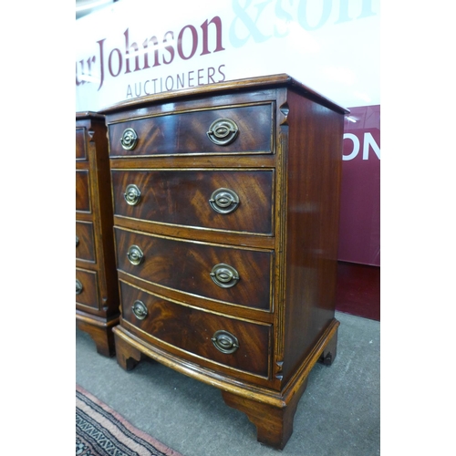 52 - A pair of mahogany bow front chests of drawers