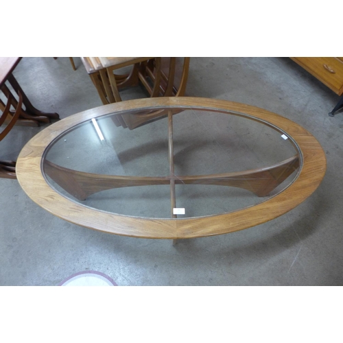 77 - A G-Plan Astro teak and glass topped oval coffee table