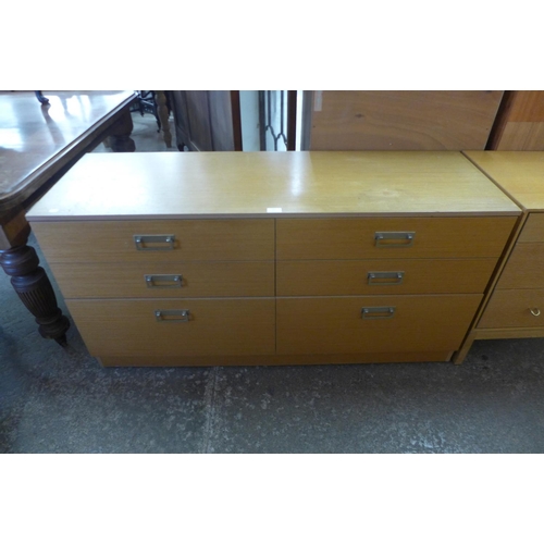 90 - A teak chest of drawers