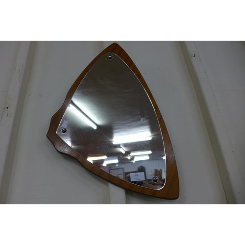 95 - A teak framed triangular mirror