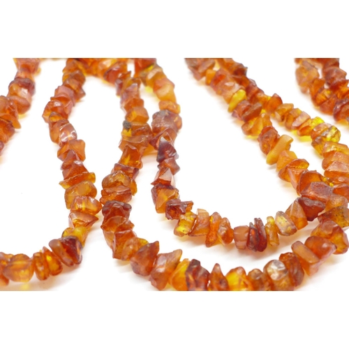 1014 - A long amber necklace, 122g