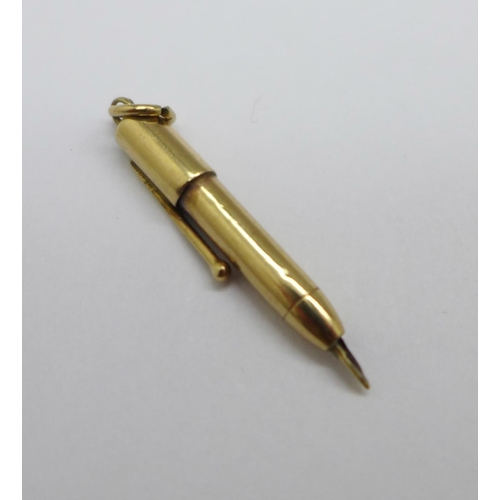 1029 - A novelty 9ct gold fountain pen charm, mark worn, 0.7g