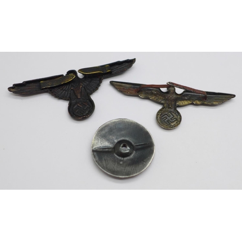 1037 - Two reproduction German badges and a badge screw back