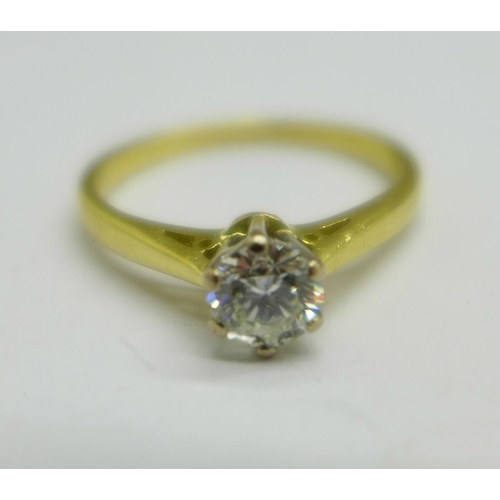 1040 - An 18ct gold, diamond solitaire ring, 0.4carat diamond weight, 2.6g, M