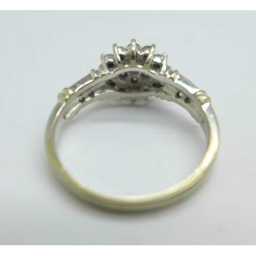 1043 - A 9ct white gold and diamond ring, 0.5carat diamond weight, marked in the shank, 2.7g, N