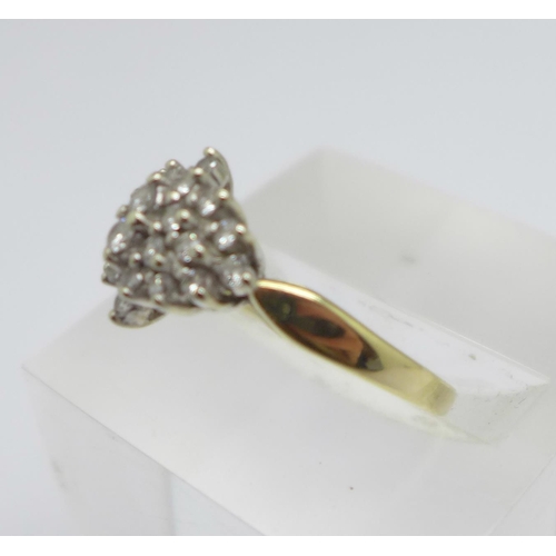 1044 - A 9ct gold and diamond ring, 0.5carat diamond weight, marked in the shank, 2.7g, N