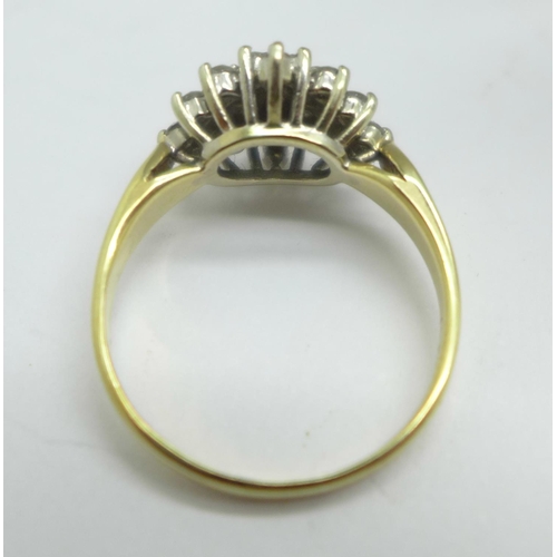 1044 - A 9ct gold and diamond ring, 0.5carat diamond weight, marked in the shank, 2.7g, N