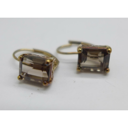 1046 - A pair of 9ct gold, smoky quartz earrings, 2g