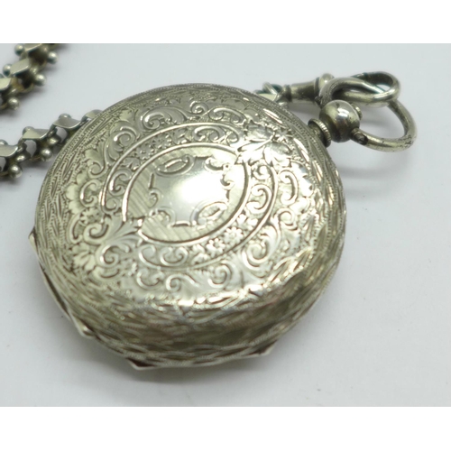 1075 - A silver fob watch with an Albertina chain, 4cm case