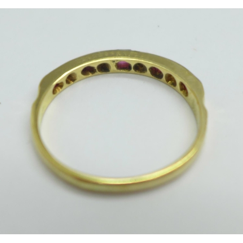 1097 - An 18ct gold, platinum set ruby and diamond ring, 2.8g, P