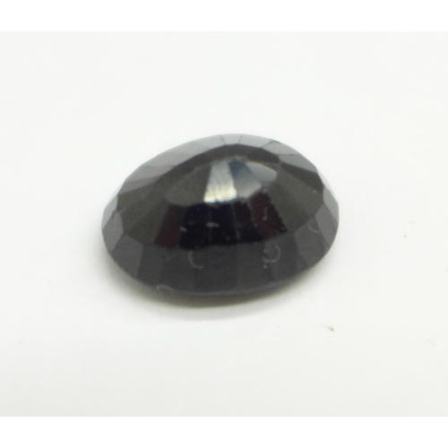 1100 - An unmounted sapphire, 9.10 carat weight