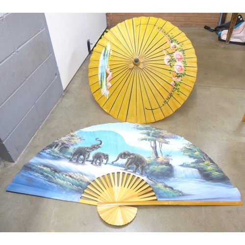 1140 - A parasol and 1m hand painted fan **PLEASE NOTE THIS LOT IS NOT ELIGIBLE FOR POSTING AND PACKING**