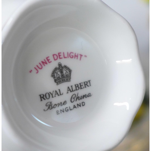 683 - A collection of Royal Stafford decorative teawares and four Royal Albert June Delight cups and sauce... 