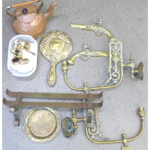 723 - A pair of brass electric light wall sconces, a copper kettle, brass ornaments, etc.