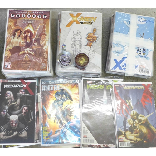 727 - A box of modern comics, each individually packaged