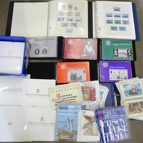 730 - A large collection of Guernsey stamps; 14x yearbooks of mint stamps 1985-1998, a Lindner   album of ... 