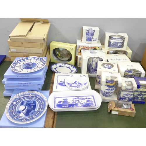 754 - A collection of Ringtons blue and white tea wares, caddies, tea for one set, mugs, place mats, etc.,... 