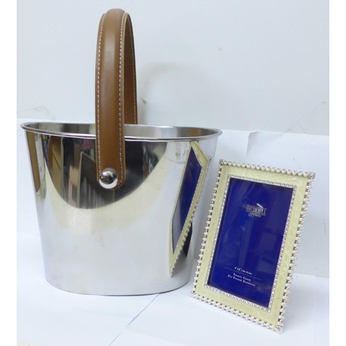 761 - A champagne bucket and a plated photograph frame