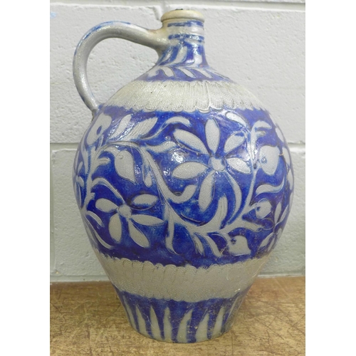 771 - A stoneware ewer with blue glaze, 41.5cm