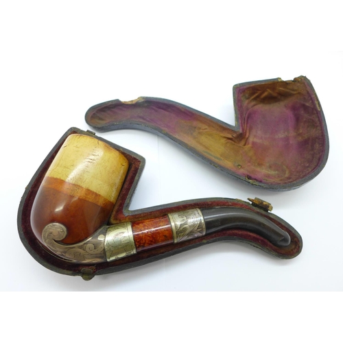 809 - A pipe, with white metal mounts, cased, stem repaired, case a/f